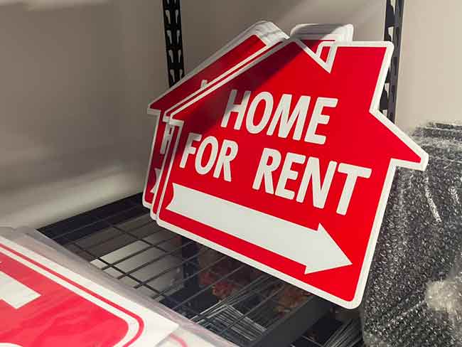 Multiple Real Estate Home for Rent Signs